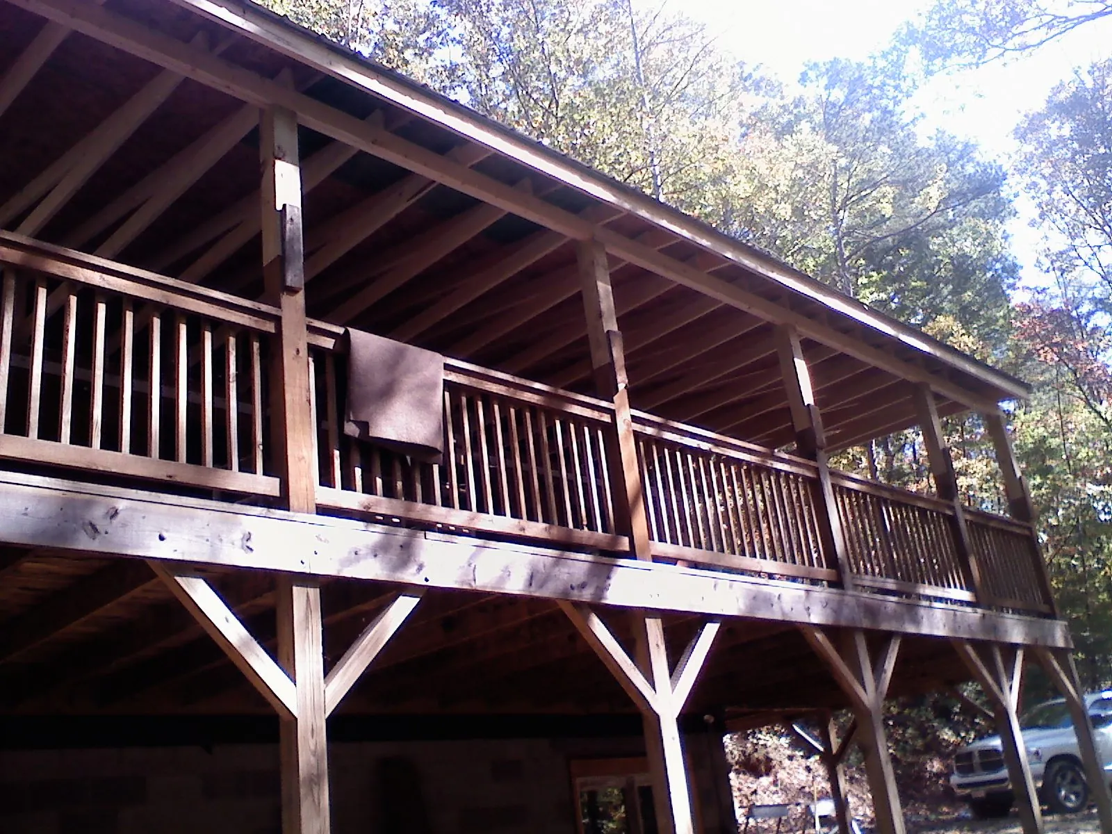 Timber framing under a new elevated porch and deck — Roof Leak Repair in Lennon by Roofing Brothers